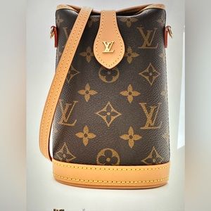 Louis Vuitton Monogram Fold Me Pouch with original packaging and receipt